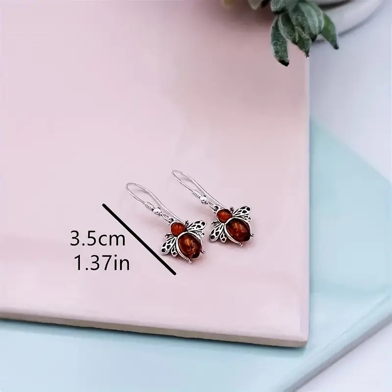 Silver bee synthetic orange gem earrings - Image 4