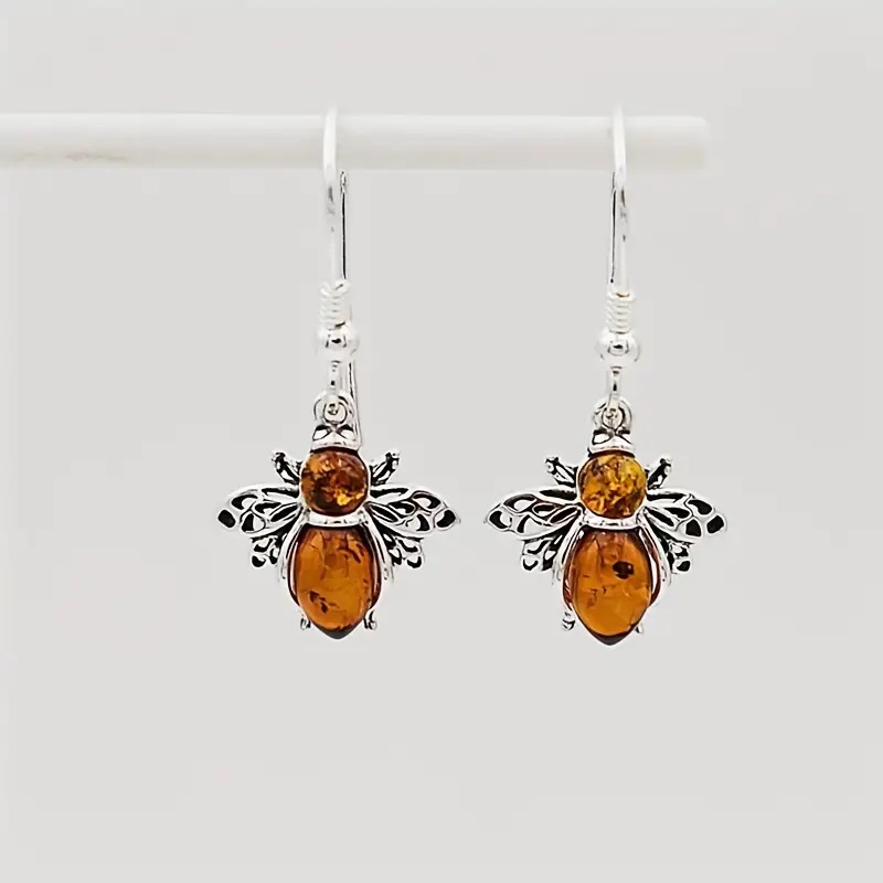 Silver bee synthetic orange gem earrings