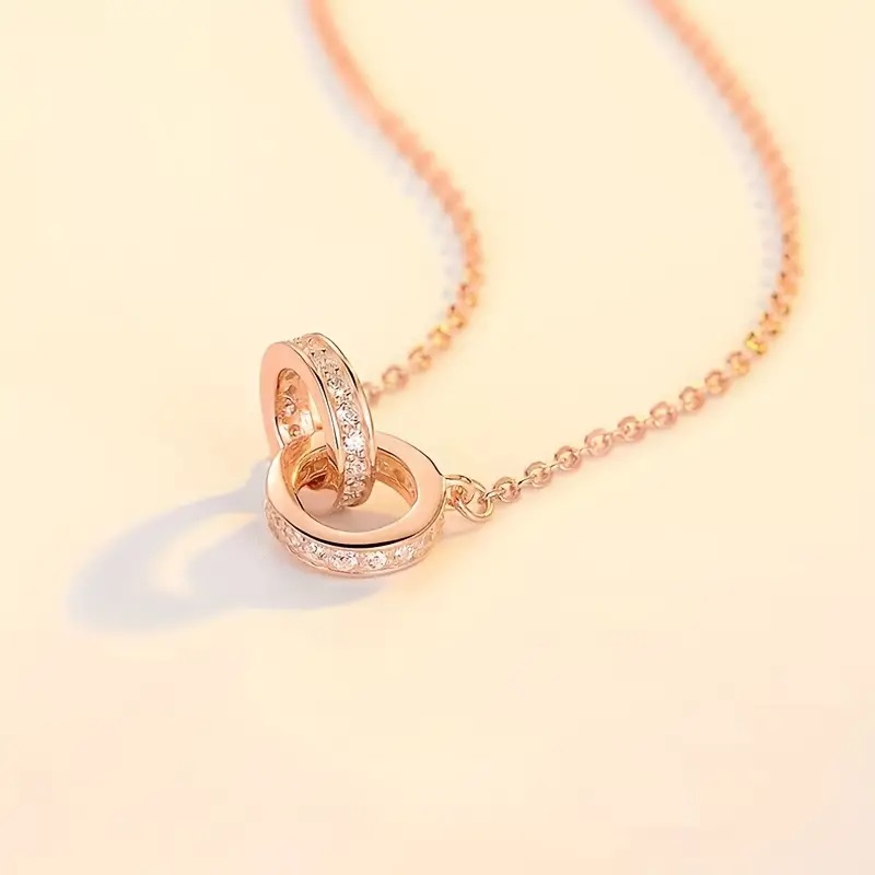 Interlocking double ring necklace